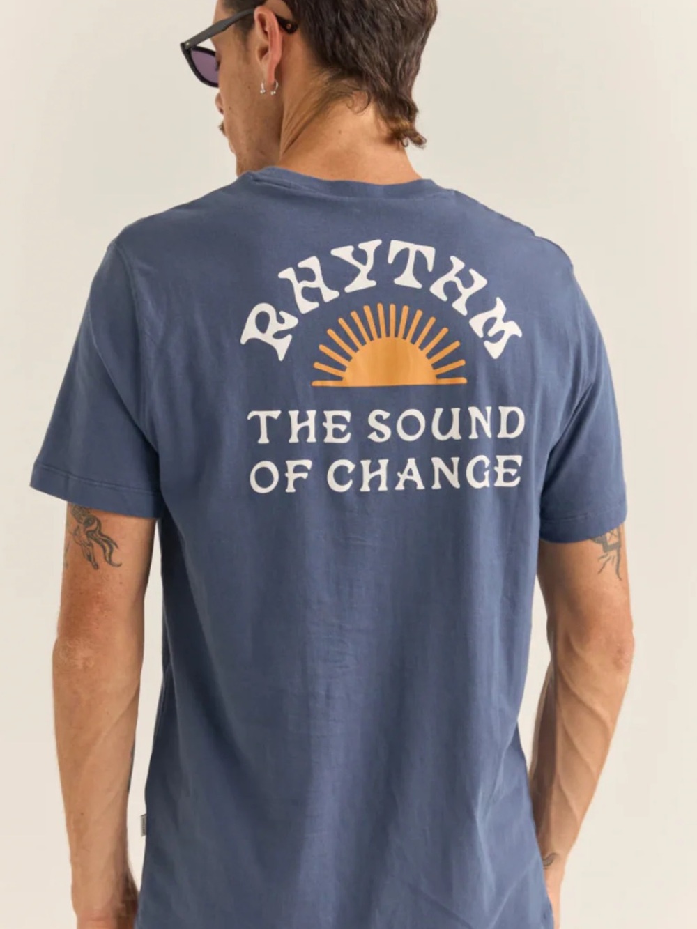 Rhythm. Navy Short-Sleeve Tee with Orange Sunrise Chest Logo